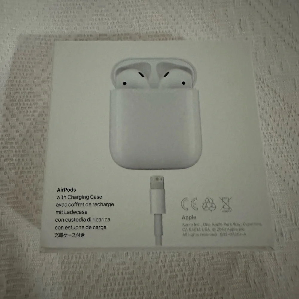 Apple AirPods with Charging Case — White